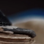 Orthodox Jewish prays at the praying book in Jewish tradition religion celebration holiday with kippah and shofar